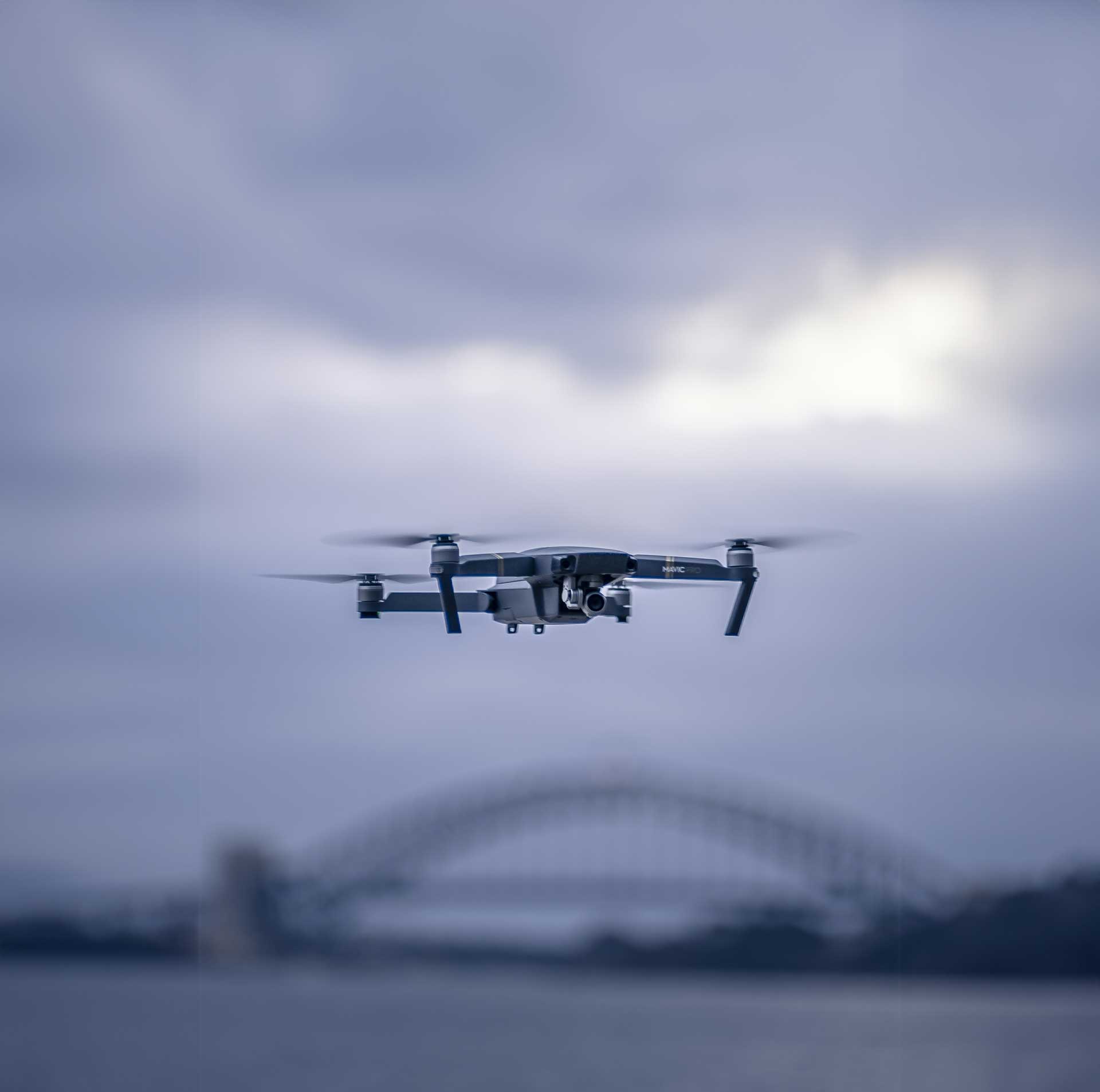 drone hovering bridge